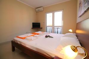 Postel nebo postele na pokoji v ubytování Guest House Villa Pastrovka