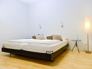 Katil atau katil-katil dalam bilik di Hotel Baders Krone