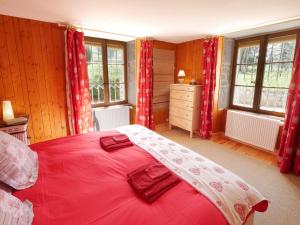Postel nebo postele na pokoji v ubytování Domaine de Bellevue Gîte du Mont Poupet