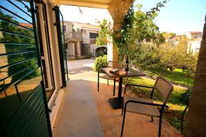 Balkón nebo terasa v ubytování Guest House Villa Pastrovka