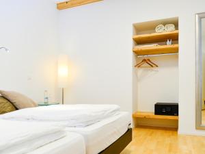 Katil atau katil-katil dalam bilik di Hotel Baders Krone