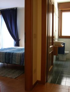 Postel nebo postele na pokoji v ubytování I Borghi