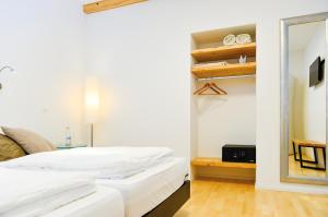 Katil atau katil-katil dalam bilik di Hotel Baders Krone