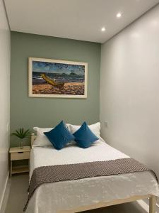 Cama ou camas em um quarto em Pousada Casablanca