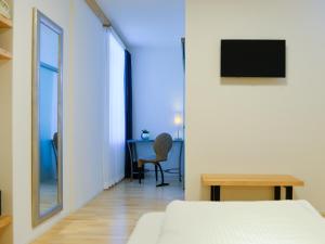 TV a/nebo společenská místnost v ubytování Hotel Baders Krone