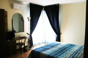 Postel nebo postele na pokoji v ubytování I Borghi