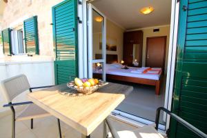 Postel nebo postele na pokoji v ubytování Guest House Villa Pastrovka