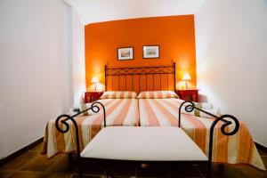 Ein Bett oder Betten in einem Zimmer der Unterkunft Casa Rural San Antonio