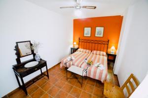 Ein Bett oder Betten in einem Zimmer der Unterkunft Casa Rural San Antonio