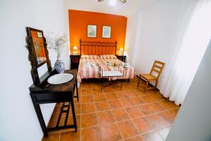 Ein Bett oder Betten in einem Zimmer der Unterkunft Casa Rural San Antonio
