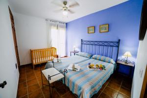 Ein Bett oder Betten in einem Zimmer der Unterkunft Casa Rural San Antonio