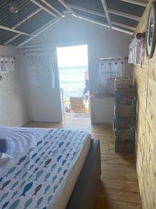 Pura Vida Baru - La Casa del Cholo客房内的一张或多张床位