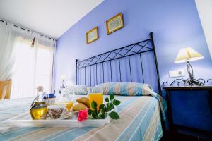 Ein Bett oder Betten in einem Zimmer der Unterkunft Casa Rural San Antonio