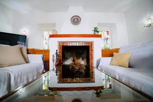 Ein Bett oder Betten in einem Zimmer der Unterkunft Casa Rural San Antonio