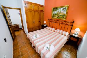 Ein Bett oder Betten in einem Zimmer der Unterkunft Casa Rural San Antonio