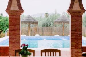 Der Swimmingpool an oder in der Nähe von Casa Rural San Antonio