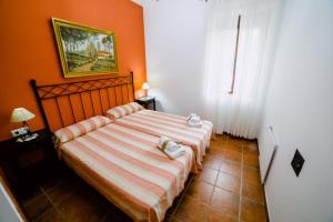 Ein Bett oder Betten in einem Zimmer der Unterkunft Casa Rural San Antonio