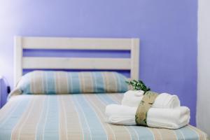 Ein Bett oder Betten in einem Zimmer der Unterkunft Casa Rural San Antonio