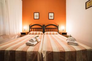 Ein Bett oder Betten in einem Zimmer der Unterkunft Casa Rural San Antonio