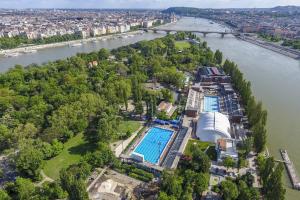 an aerial view of a resort on the river at Central Studio Budapest in Budapest