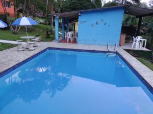 A piscina localizada em Pousada Bela Vista ou nos arredores