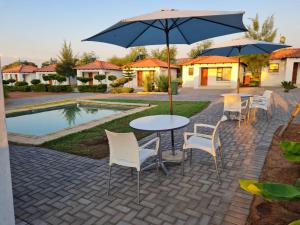 Bazén v ubytování Mminanoko Eco Guesthouse nebo v jeho okolí