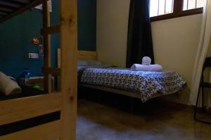 Cama o camas de una habitación en Apartamento Turístico Javalambre Snow