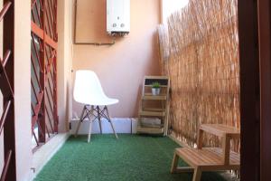 Posedenie v ubytovaní Apartamento centro paseo maritimo