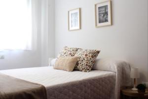 Posteľ alebo postele v izbe v ubytovaní Apartamento centro paseo maritimo