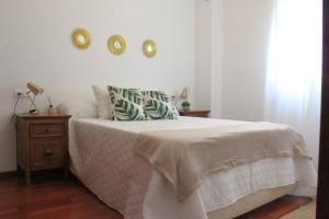 Posteľ alebo postele v izbe v ubytovaní Apartamento centro paseo maritimo