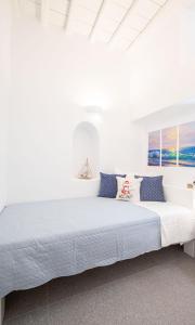 Postel nebo postele na pokoji v ubytování Sole Blu Mykonos Town Apartment Two