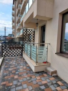 a balcony of a building with a railing at BYA Luxury in Valea Lupului