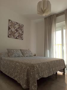 Posteľ alebo postele v izbe v ubytovaní Apartamento la Noria 2 Playa