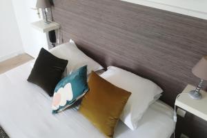 Cama ou camas em um quarto em Hotel De L'Europe