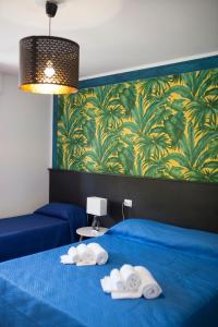 En eller flere senge i et værelse på B&B Il Cavaliere Tropea + 41 billeder