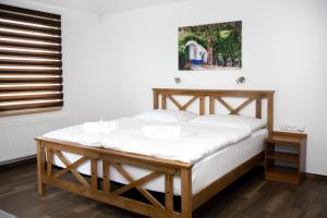 Postel nebo postele na pokoji v ubytování Penzion U Svaťoša