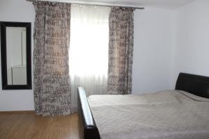 Cama o camas de una habitación en Apartment aPriori-Baden-Baden
