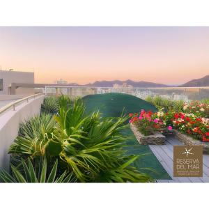 a view from the balcony of a building with flowers at Reserva del Mar 810 in Gaira