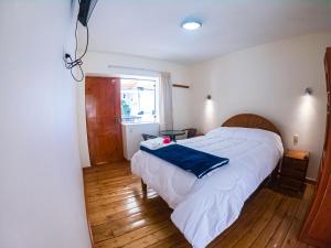 Hotel Los Laureles客房内的一张或多张床位