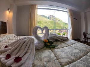 Hotel Los Laureles客房内的一张或多张床位