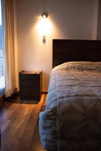 Hotel Los Laureles客房内的一张或多张床位