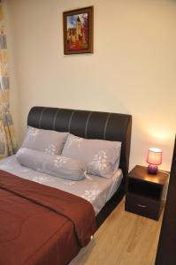 Postel nebo postele na pokoji v ubytování AmySity Homestay Gandaria Modern Lifestyle walking distance to Hub Shopping Centre at Sek 9 Bangi Sentral With Netflix