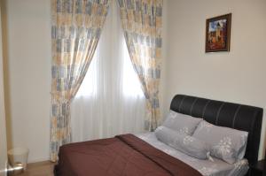 Postel nebo postele na pokoji v ubytování AmySity Homestay Gandaria Modern Lifestyle walking distance to Hub Shopping Centre at Sek 9 Bangi Sentral With Netflix