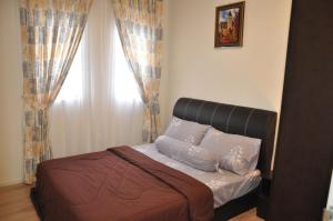 Postel nebo postele na pokoji v ubytování AmySity Homestay Gandaria Modern Lifestyle walking distance to Hub Shopping Centre at Sek 9 Bangi Sentral With Netflix + 30 fotografií