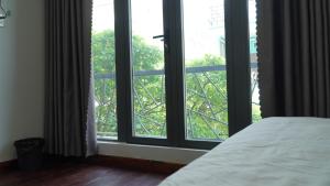 Letto o letti in una camera di 5 Elements Hotel