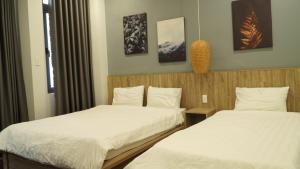 Letto o letti in una camera di 5 Elements Hotel