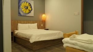 Letto o letti in una camera di 5 Elements Hotel
