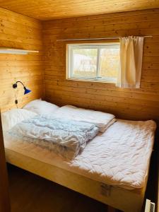 Postel nebo postele na pokoji v ubytování Hummingen camping hus 3
