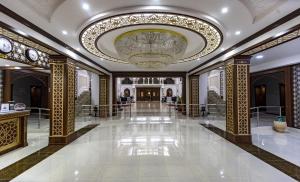 Ο χώρος του λόμπι ή της ρεσεψιόν στο Erkin Palace Hotel