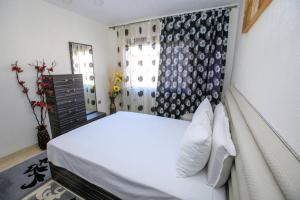 Ένα ή περισσότερα κρεβάτια σε δωμάτιο στο Apartment Lucy